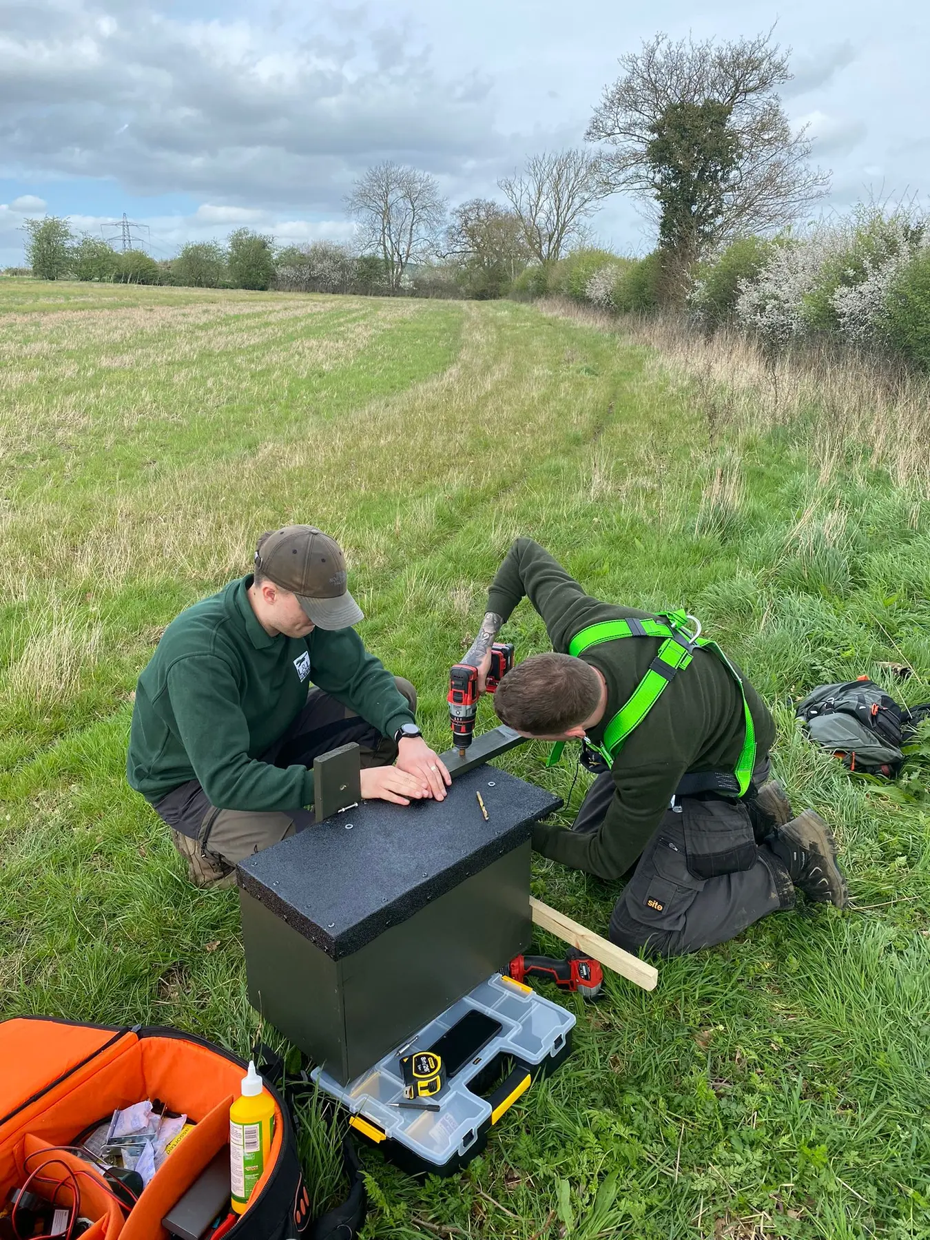 Preparing a nest box and monitoring equipment in the field